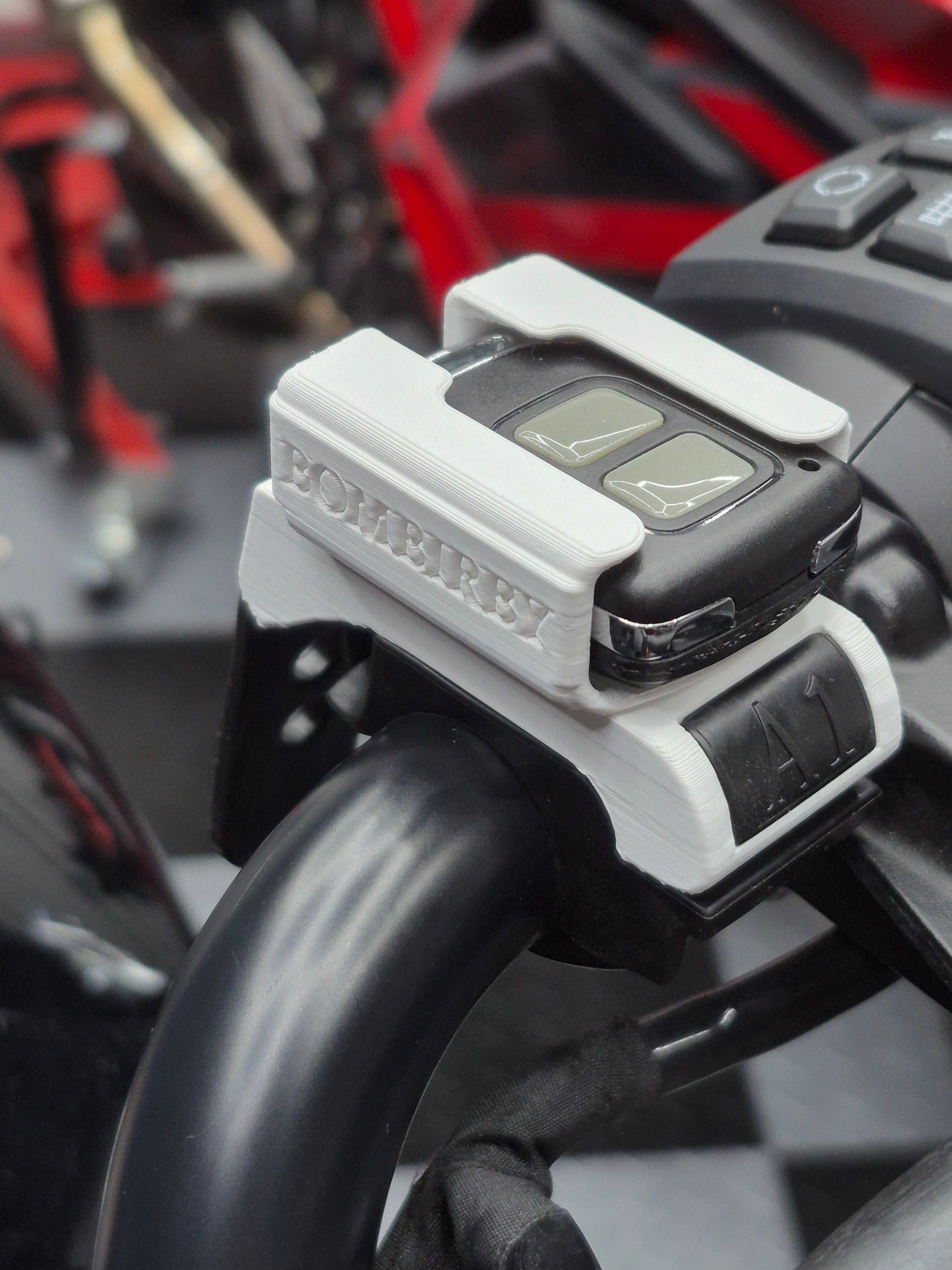 Alpha 1.2 Garage Remote mount for handlebar.